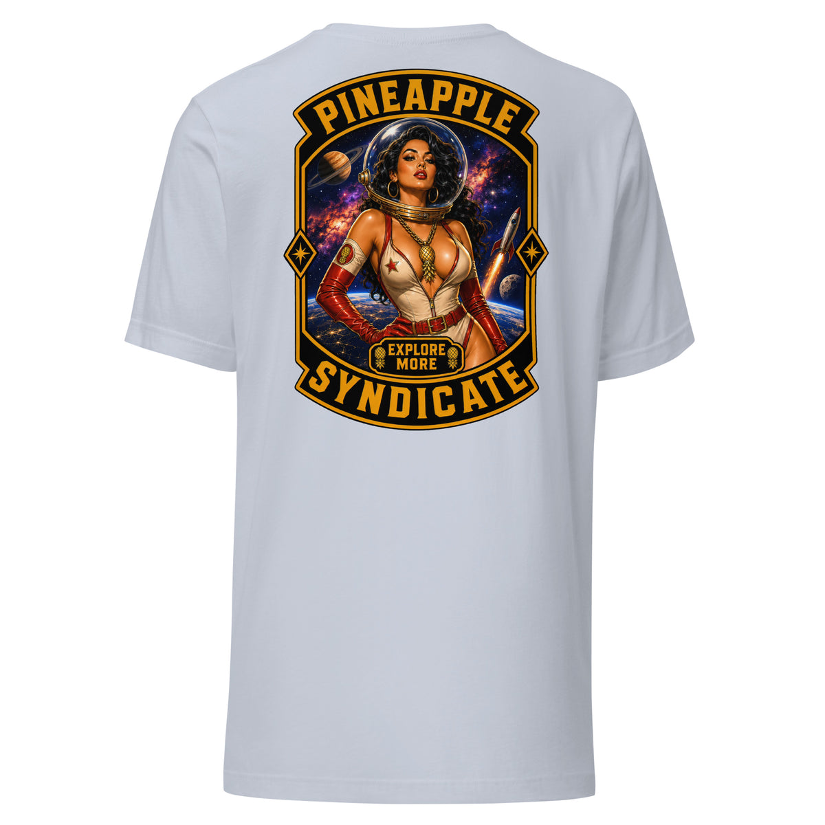 Pineapple Syndicate Explore More tee featuring an astronaut pinup in a bubble helmet with rocket launch, planets, galaxy backdrop, pineapple patch, gold pineapple pendant, and black-and-gold framing.