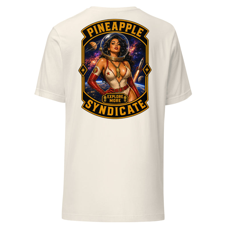 Pineapple Syndicate Explore More tee featuring an astronaut pinup in a bubble helmet with rocket launch, planets, galaxy backdrop, pineapple patch, gold pineapple pendant, and black-and-gold framing.