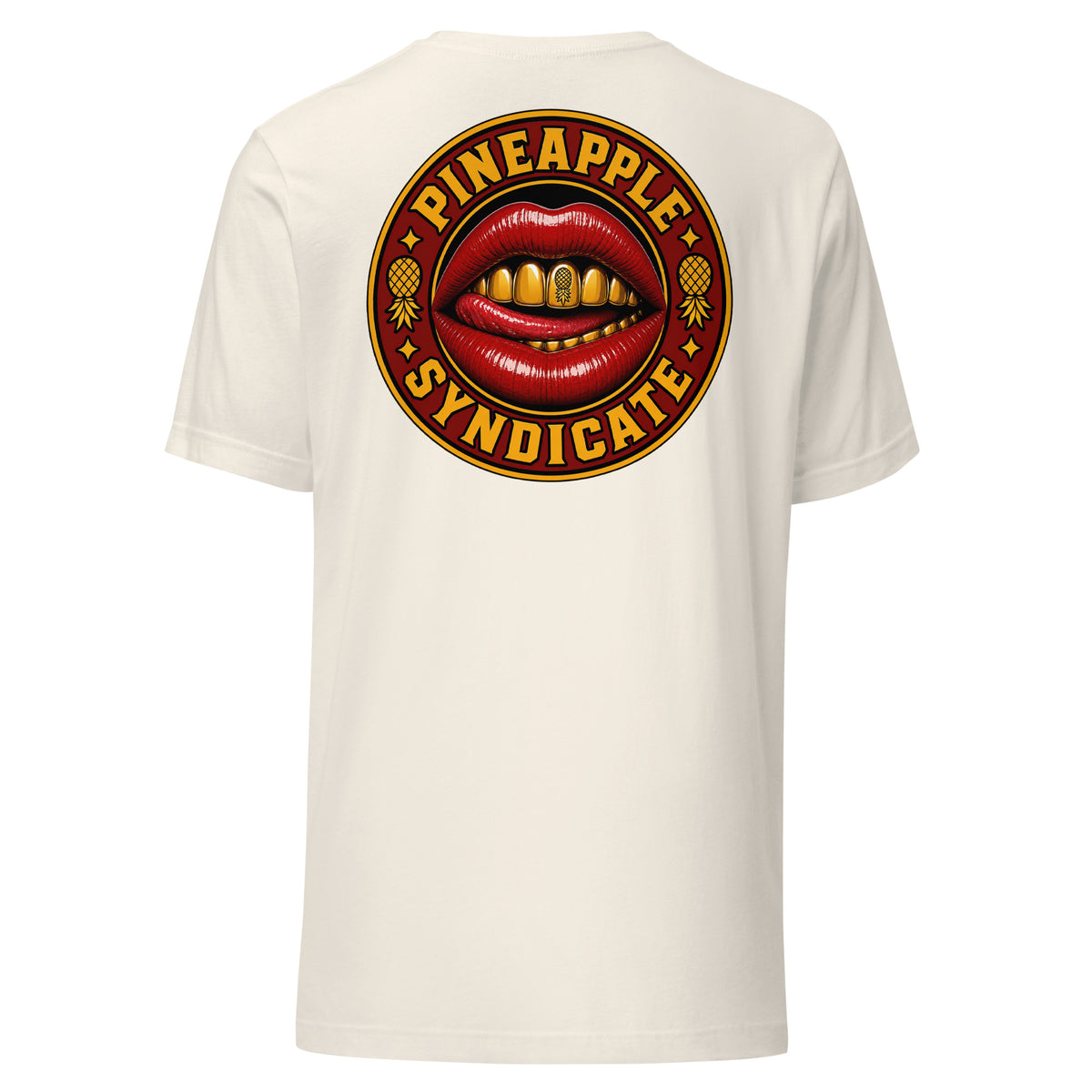 Pineapple Syndicate Gold Grill Signal tee featuring glossy red lips with a gold grill, pineapple tooth detail, pineapple side icons, and bold red-and-gold circular framing.