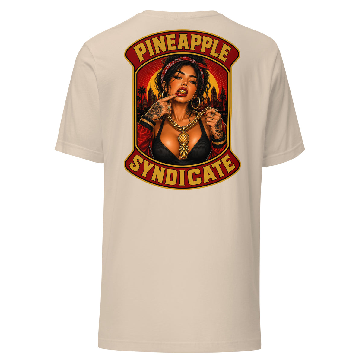 Pineapple Syndicate tee featuring a tattooed pinup with a gold grill, heavy gold chain with pineapple pendant, city skyline, and bold red-and-gold framing.