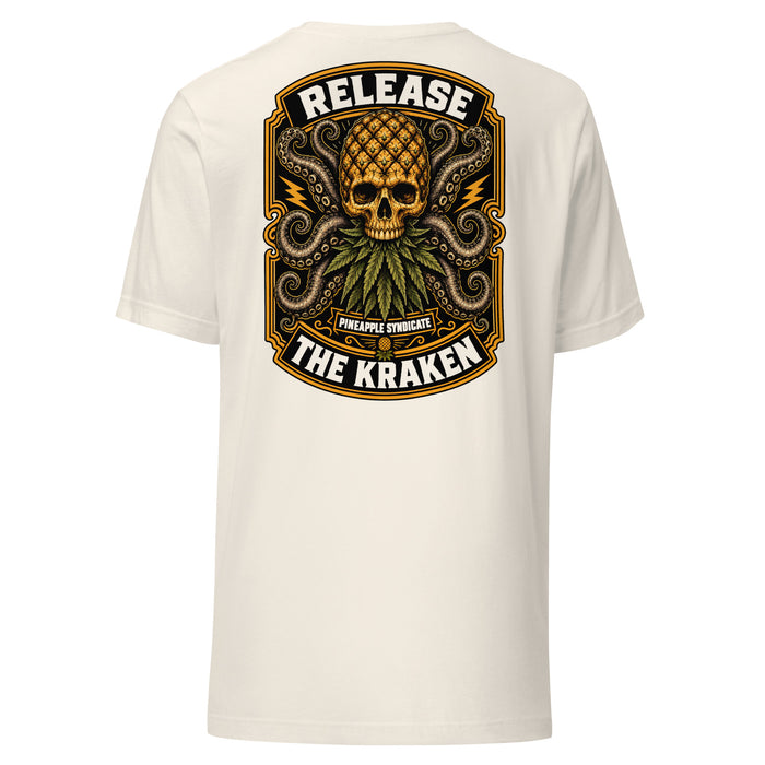 Pineapple Syndicate Release the Kraken tee featuring a pineapple skull with kraken tentacles, lightning details, black-and-gold framing, and bold statement lettering.