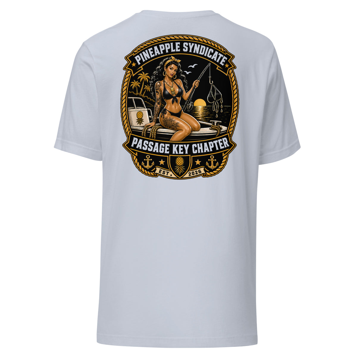Pineapple Syndicate Passage Key Chapter tee featuring a tattooed fishing pinup on a boat at sunset with pineapple crest, anchors, rope framing, and nautical details.
