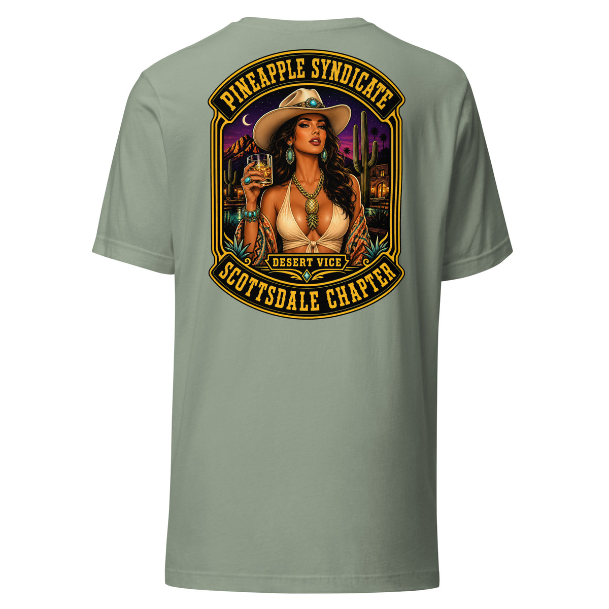 Pineapple Syndicate Scottsdale Chapter tee featuring a pinup in a cowboy hat with whiskey glass, desert skyline, cacti, and bold black-and-gold framing.