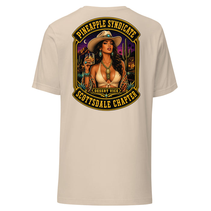 Pineapple Syndicate Scottsdale Chapter tee featuring a pinup in a cowboy hat with whiskey glass, desert skyline, cacti, and bold black-and-gold framing.