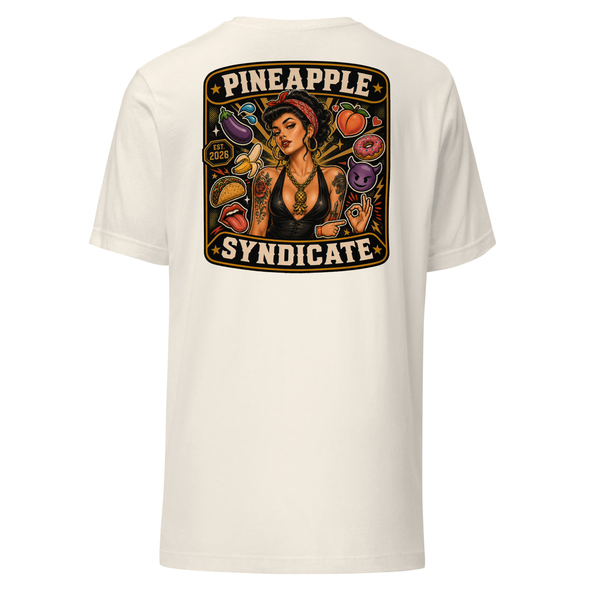 Pineapple Syndicate Speak in Code tee featuring a tattooed pinup with gold pineapple pendant surrounded by playful coded icons, emoji-style graphics, and bold black-and-cream framing.