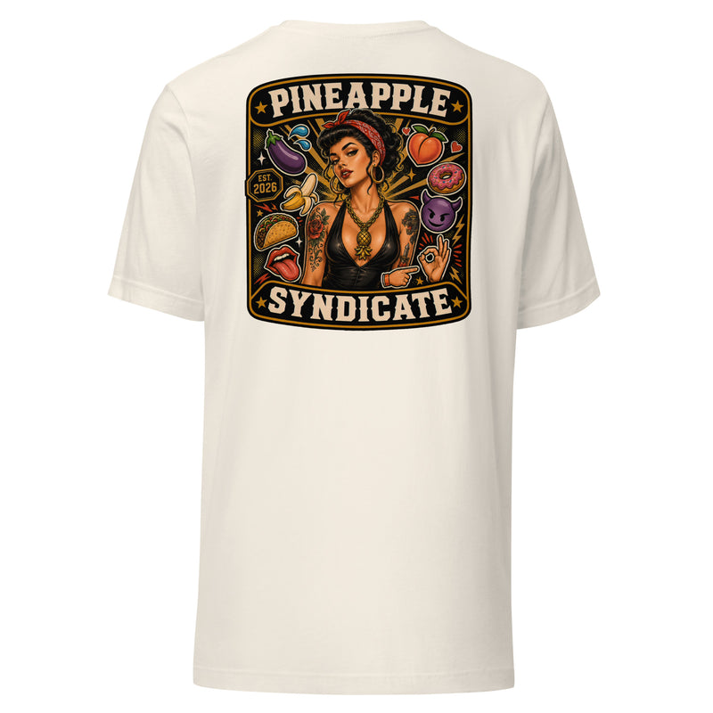 Pineapple Syndicate Speak in Code tee featuring a tattooed pinup with gold pineapple pendant surrounded by playful coded icons, emoji-style graphics, and bold black-and-cream framing.