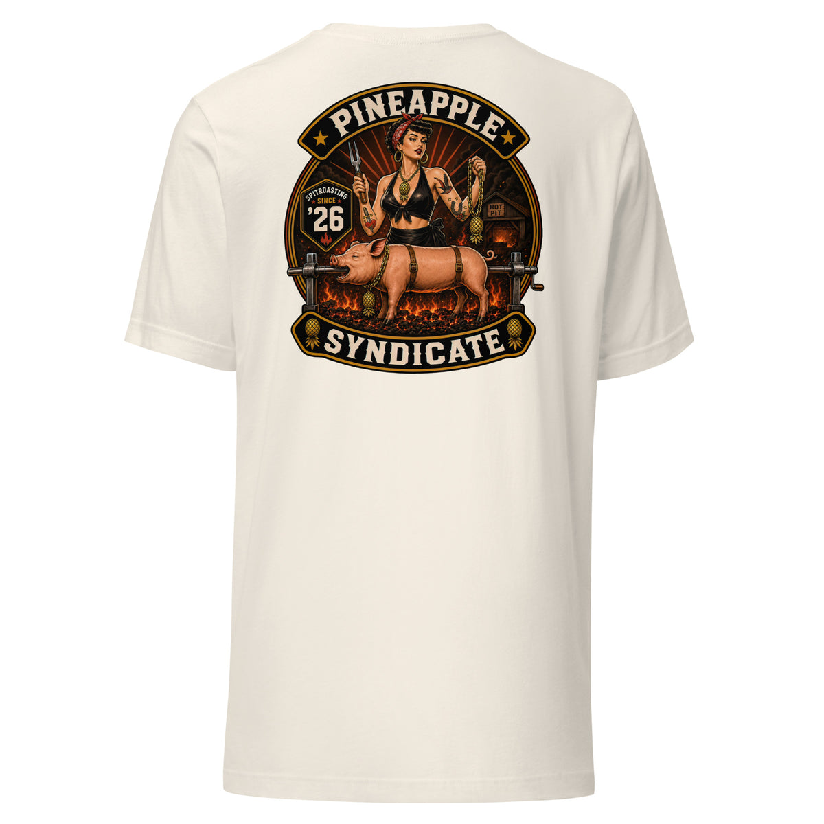 Pineapple Syndicate Spitroasting Since ’26 tee featuring a retro pinup with grilling fork, spit-roast pig scene, hot-pit backdrop, pineapple chain details, and bold black, cream, and red framing.