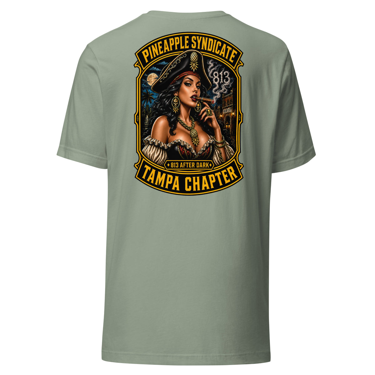 Pineapple Syndicate Tampa Chapter tee featuring a pirate pinup smoking a cigar, smoke-formed 813, Ybor City backdrop, moonlit skyline, and bold black-and-gold framing.