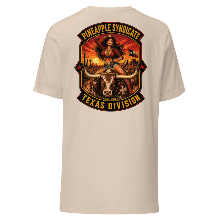 Pineapple Syndicate Texas Division tee featuring a cowgirl pinup riding a longhorn bull with Texas flag, desert cactus backdrop, sunset skyline, Est. 2026 badge, and bold black, red, and gold framing.