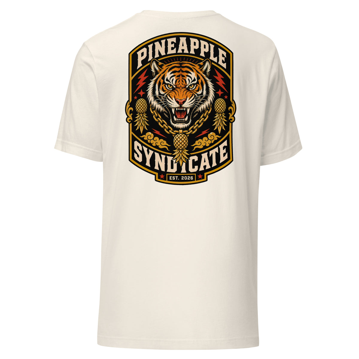Pineapple Syndicate Tiger Signal tee featuring a roaring tiger with a gold pineapple chain pendant, pineapple side icons, red lightning accents, and bold black-and-cream framing.