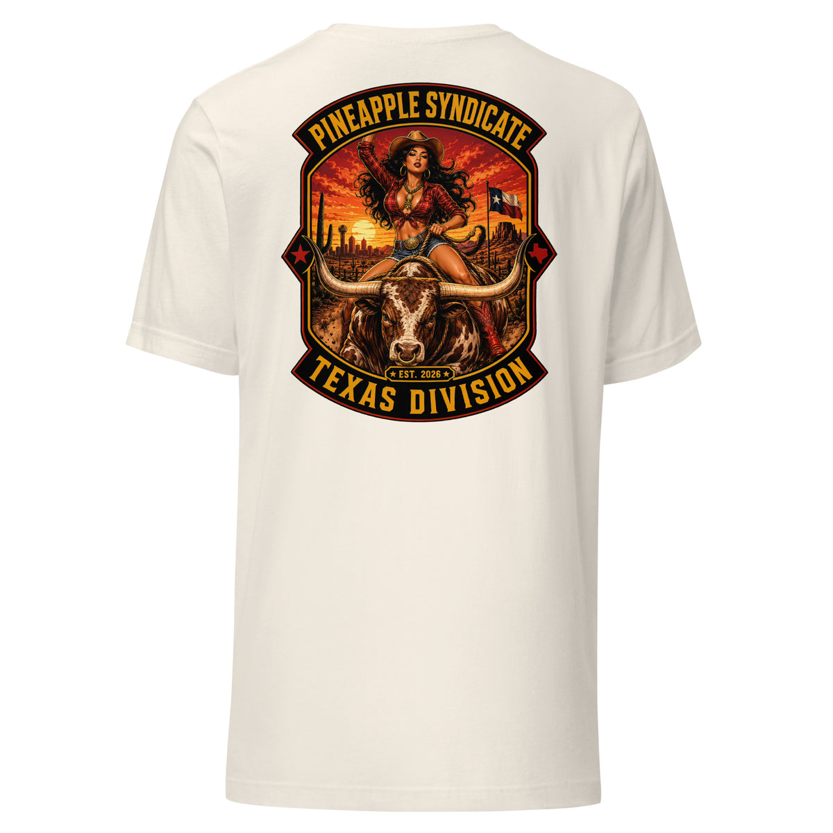 Pineapple Syndicate Texas Division tee featuring a cowgirl pinup riding a longhorn bull with Texas flag, desert cactus backdrop, sunset skyline, Est. 2026 badge, and bold black, red, and gold framing.